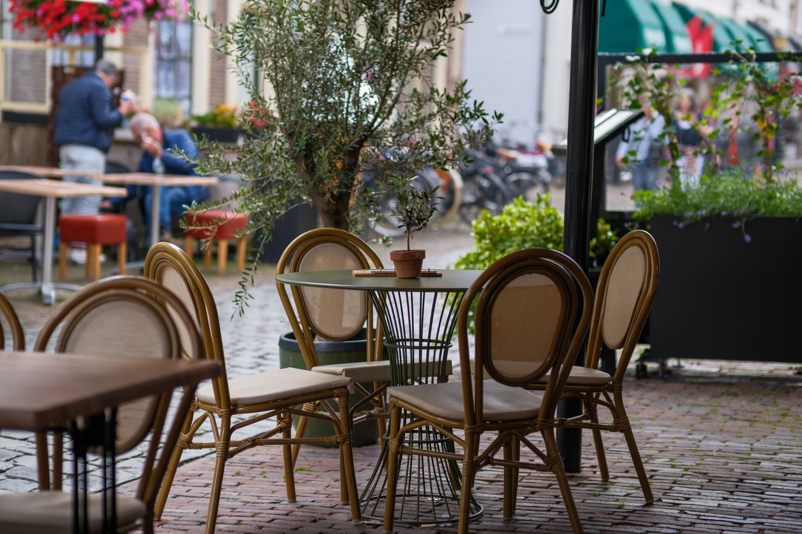 Tables and chairs outside the café, ready for sunny days