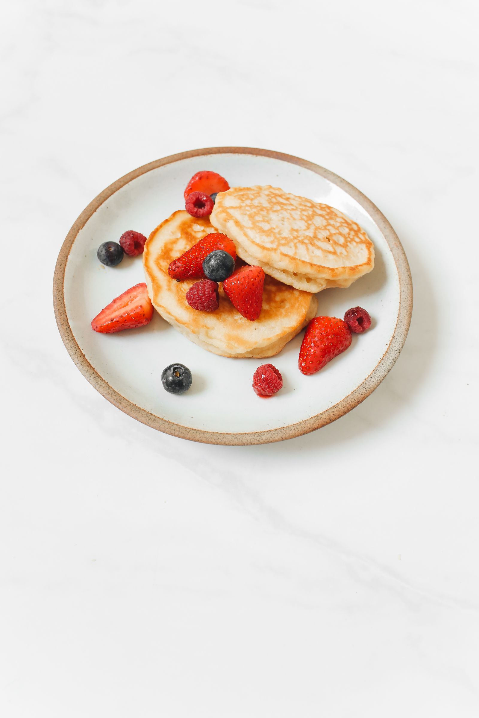 Mabel's pancakes topped with fresh seasonal berries