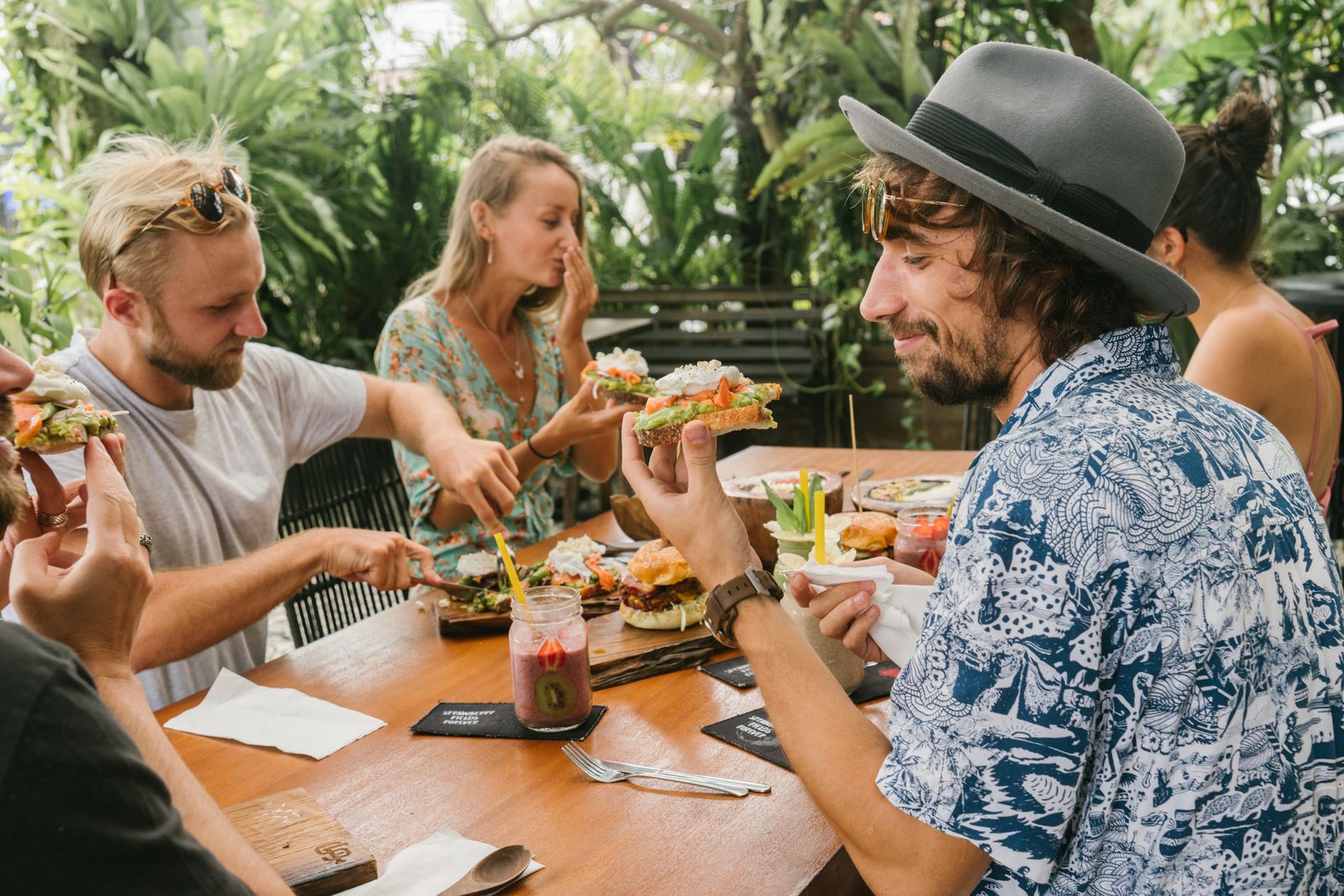 Friends sharing brunch around a wooden table